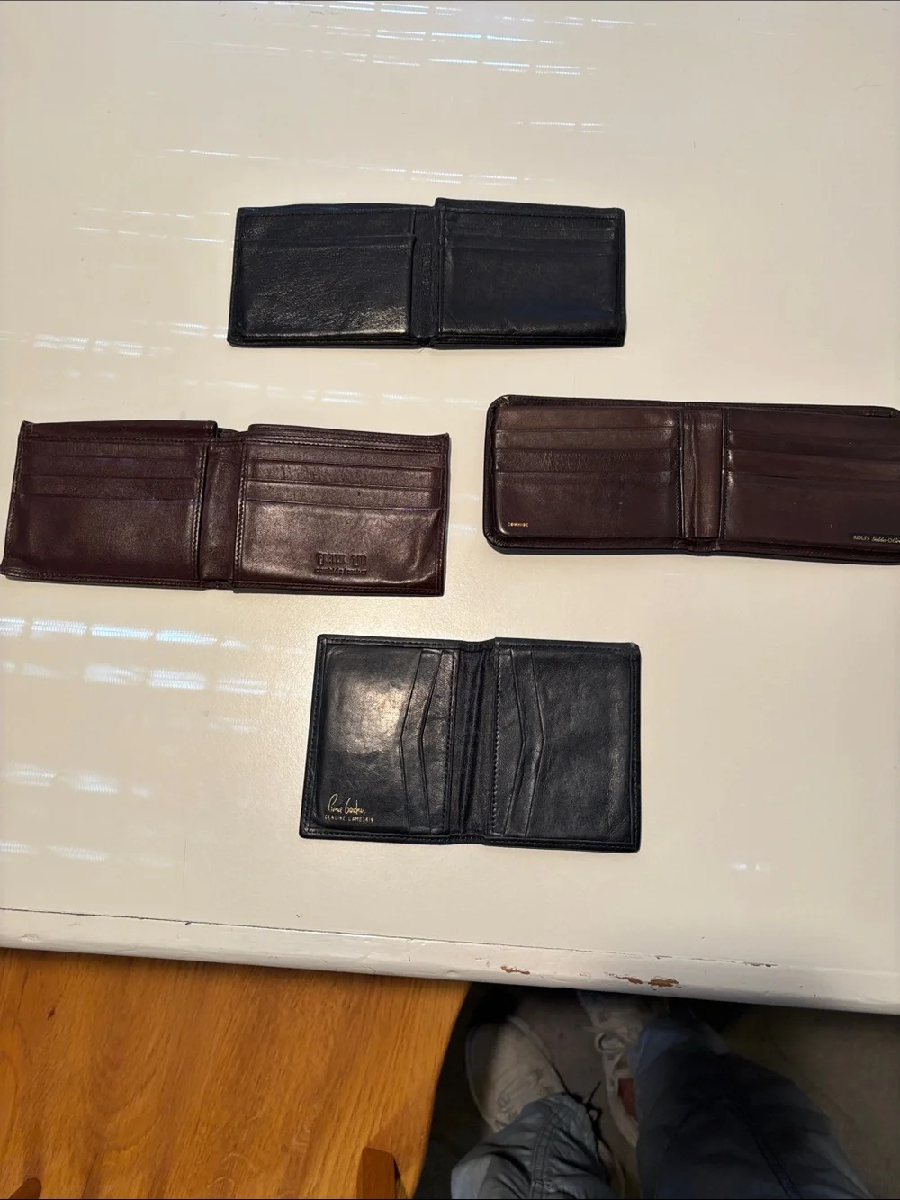 Four Vintage Black and Brown Leather Men's Wallets
